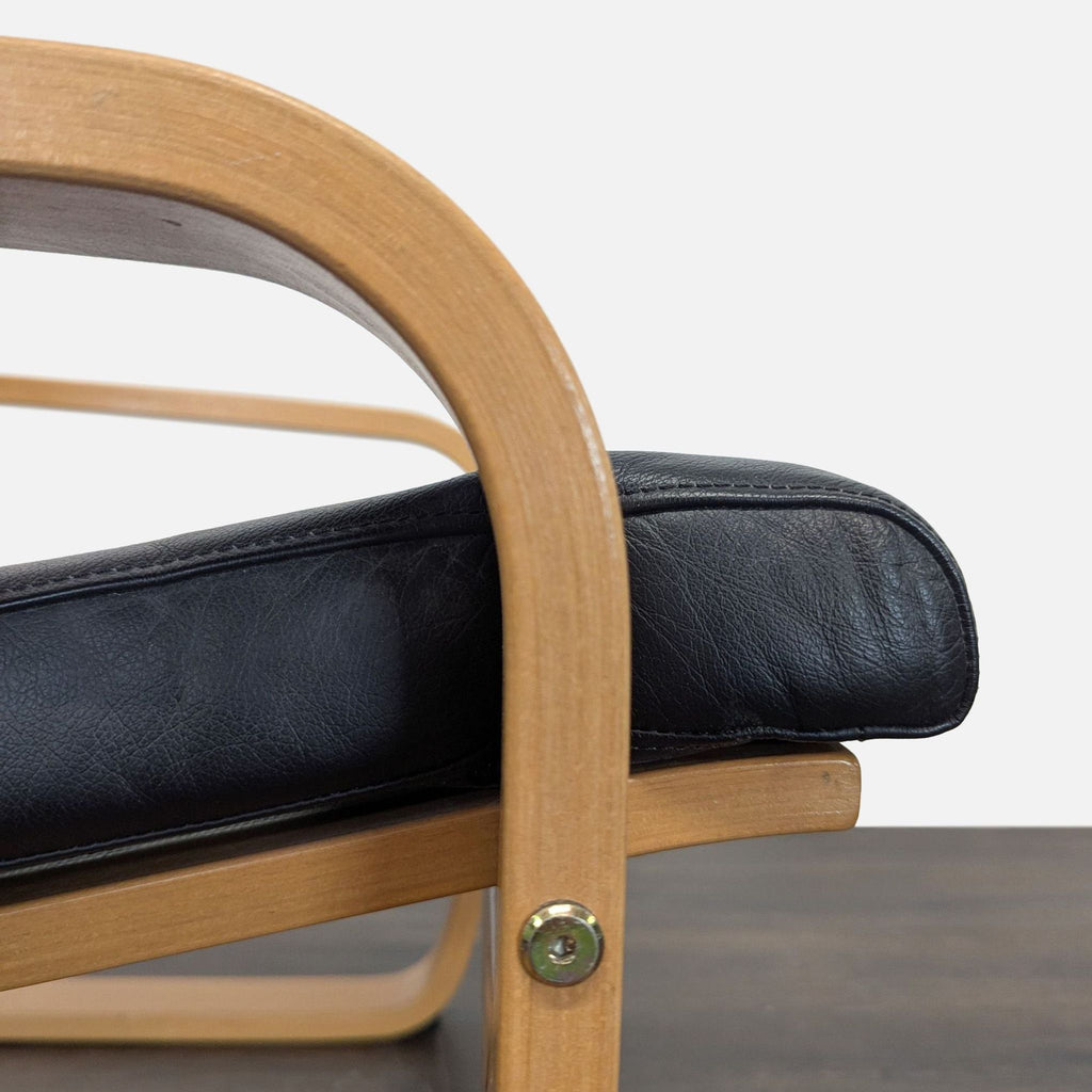 Modern Lounge Chair with Wooden Frame and Black Leather Cushion
