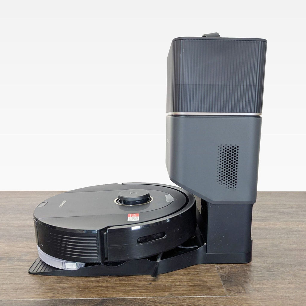 Roborock vacuum and dock combo automates dustbin emptying for efficient floor cleaning with minimal effort.