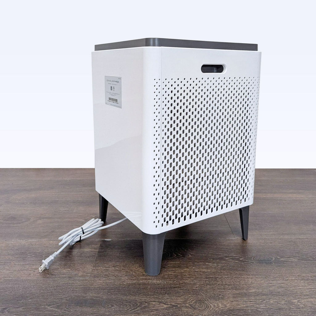 Modern Coway air purifier designed for home or office, featuring easy-carry handles and stable base.