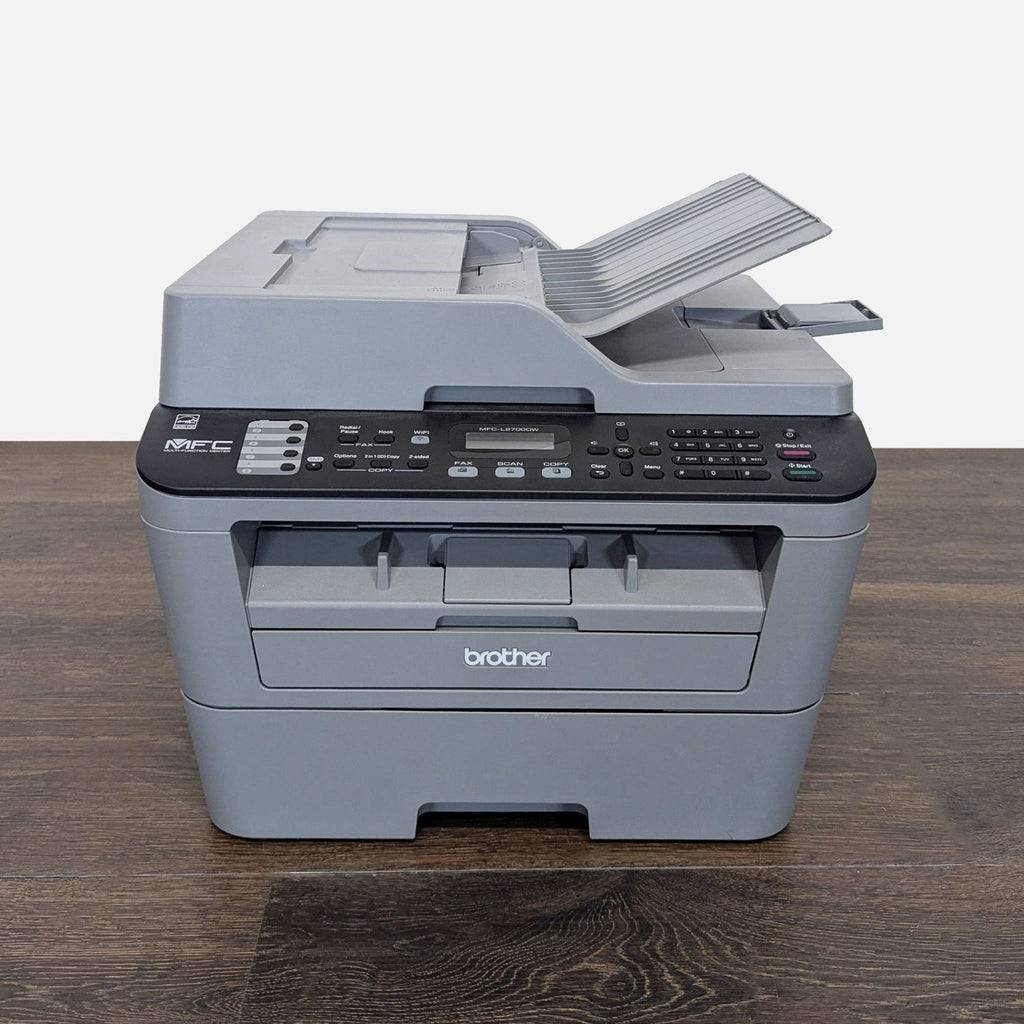 Brother all-in-one printer with scanner and copier, compact design, suitable for home or office use.