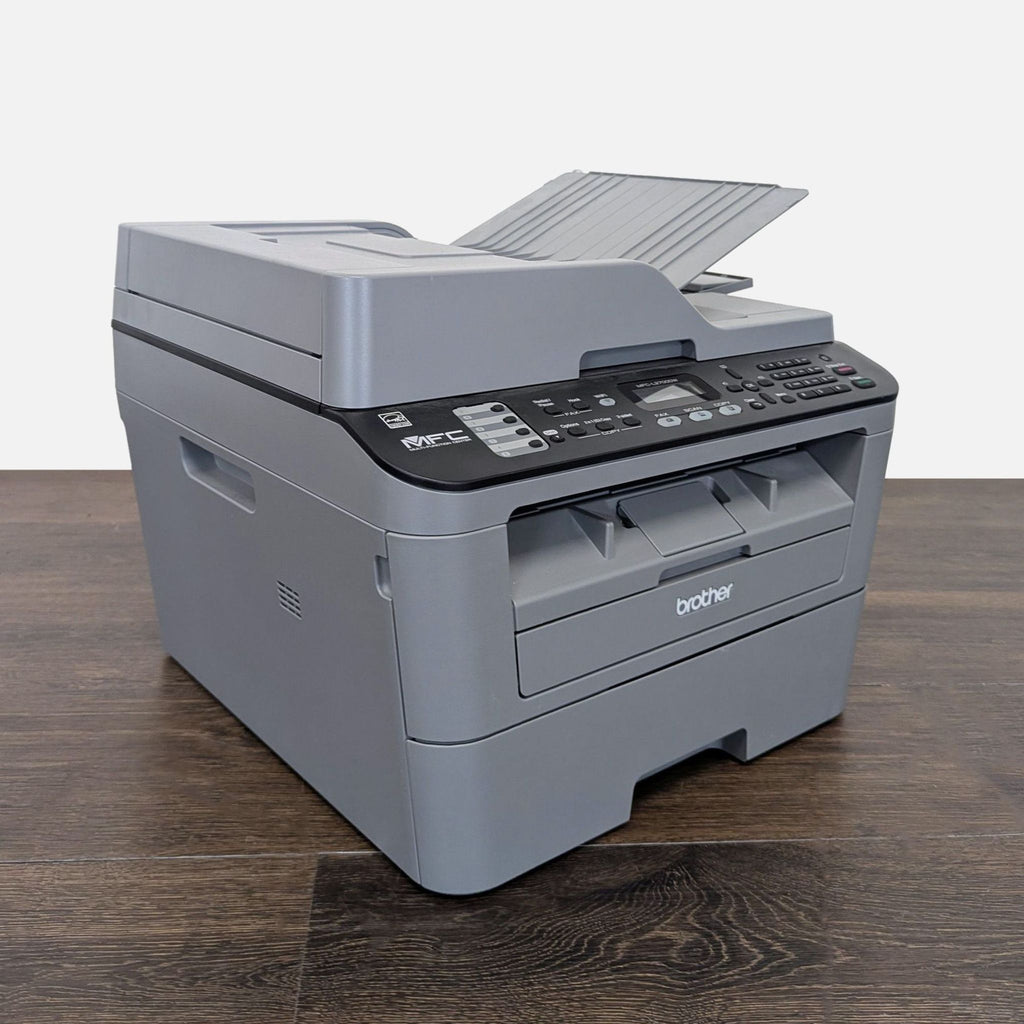 Compact Brother all-in-one device for printing, scanning, copying, and faxing, ideal for daily office tasks.