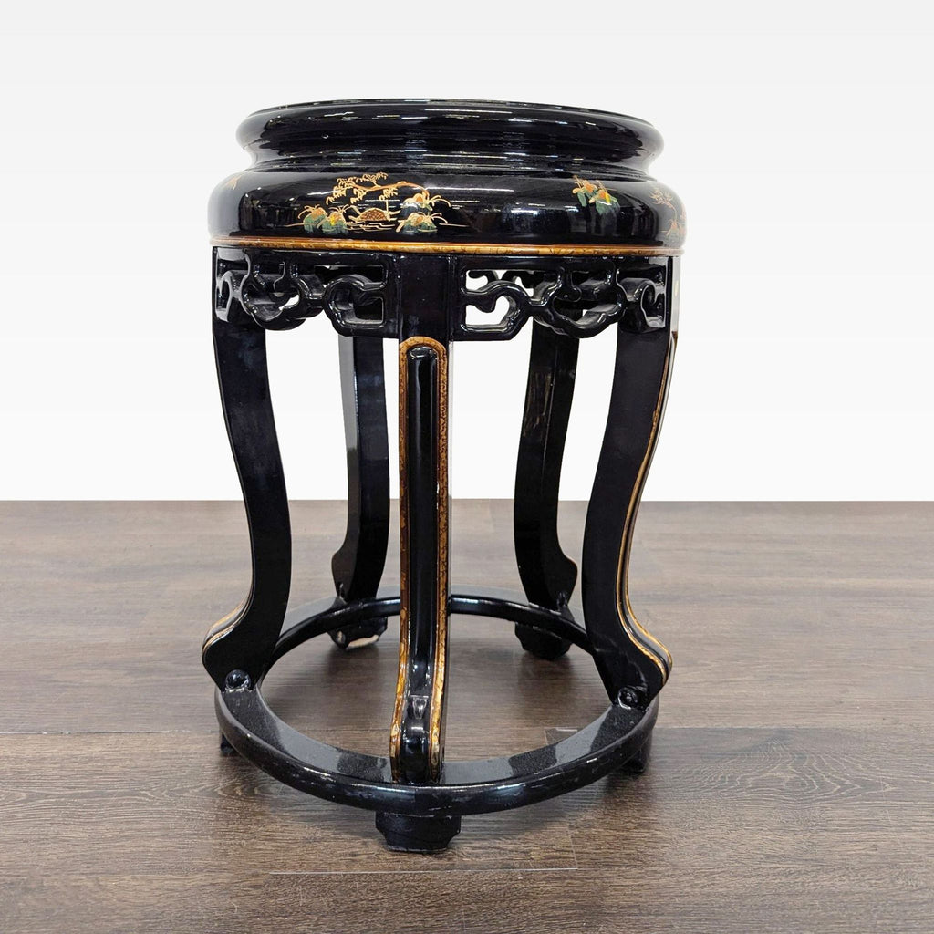 3. Ornate black lacquered bench with curved legs, painted gold scenery, and openwork carvings, decorative and functional.