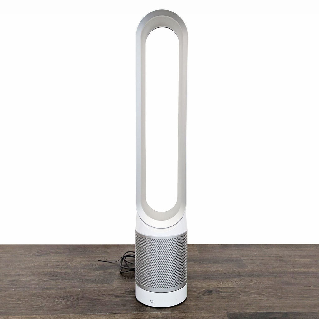 Dyson tower air purifier and fan with bladeless design, ideal for cooling and cleaning home air.