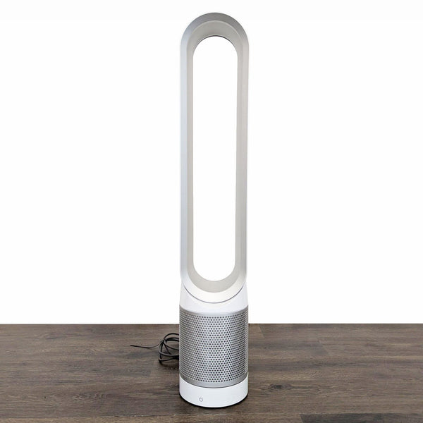 Dyson tower air purifier and fan with bladeless design, ideal for cooling and cleaning home air.