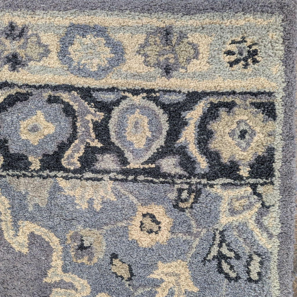 Blue and ivory floral runner rug from Pottery Barn, featuring a soft, thick pile and timeless design.