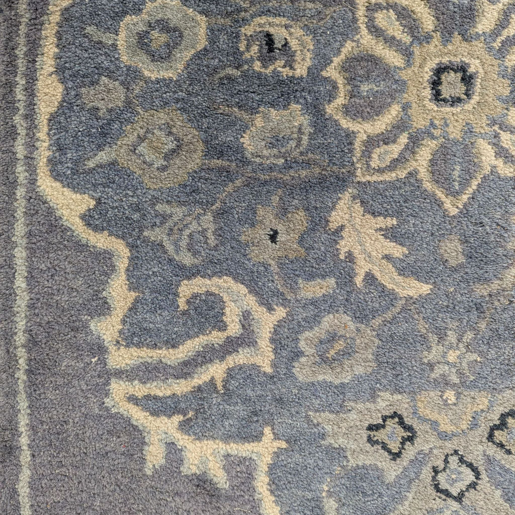 Elegant medallion rug in blue and ivory by Pottery Barn, ideal for stylish and durable hallway decor.