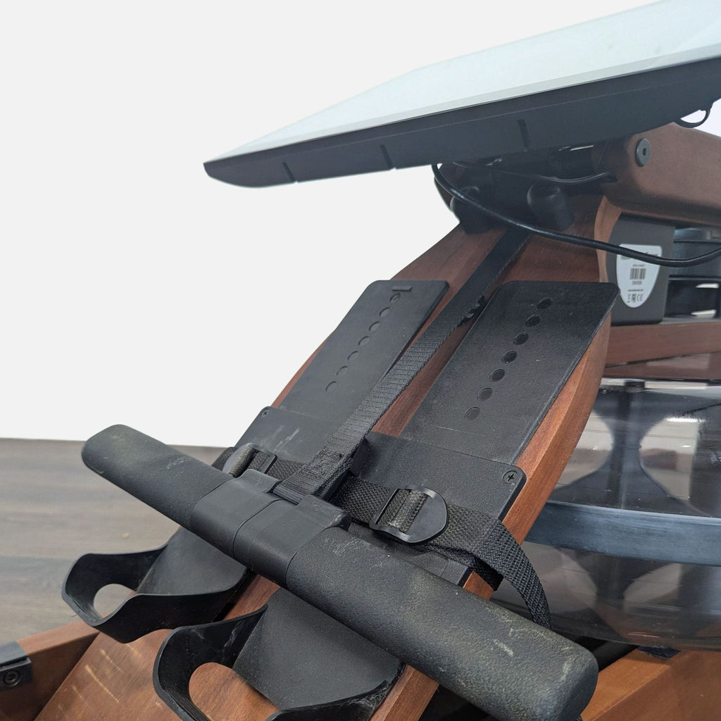 3. Compact wooden WaterRower rower with monitor, ergonomic seat, and upright storage for home gyms.