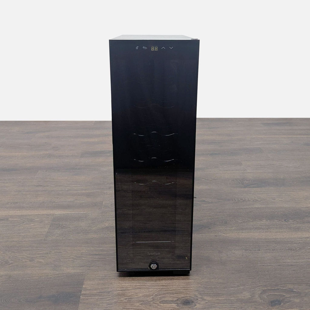 Slim black Ivation refrigerator with glass door, perfect for storing wine in compact spaces, shown closed.