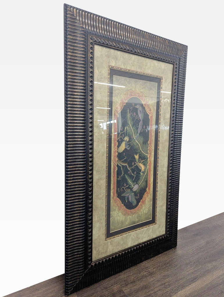 Framed artwork depicting detailed birds and plants in antique Asian style, with dramatic black and gold tones.