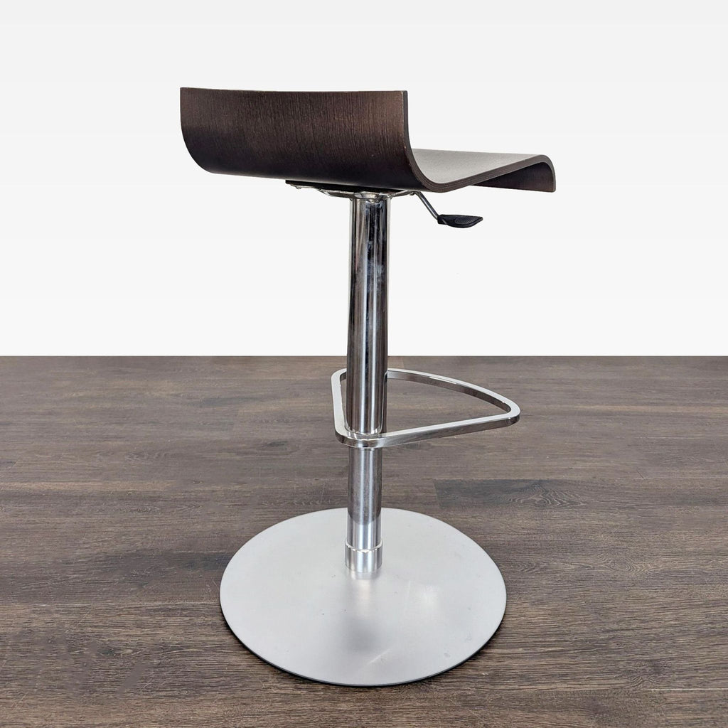 3. Adjustable Ligne Roset Pam bar stool in walnut-stained oak with chrome base, designed by Dondoli & Poccil.