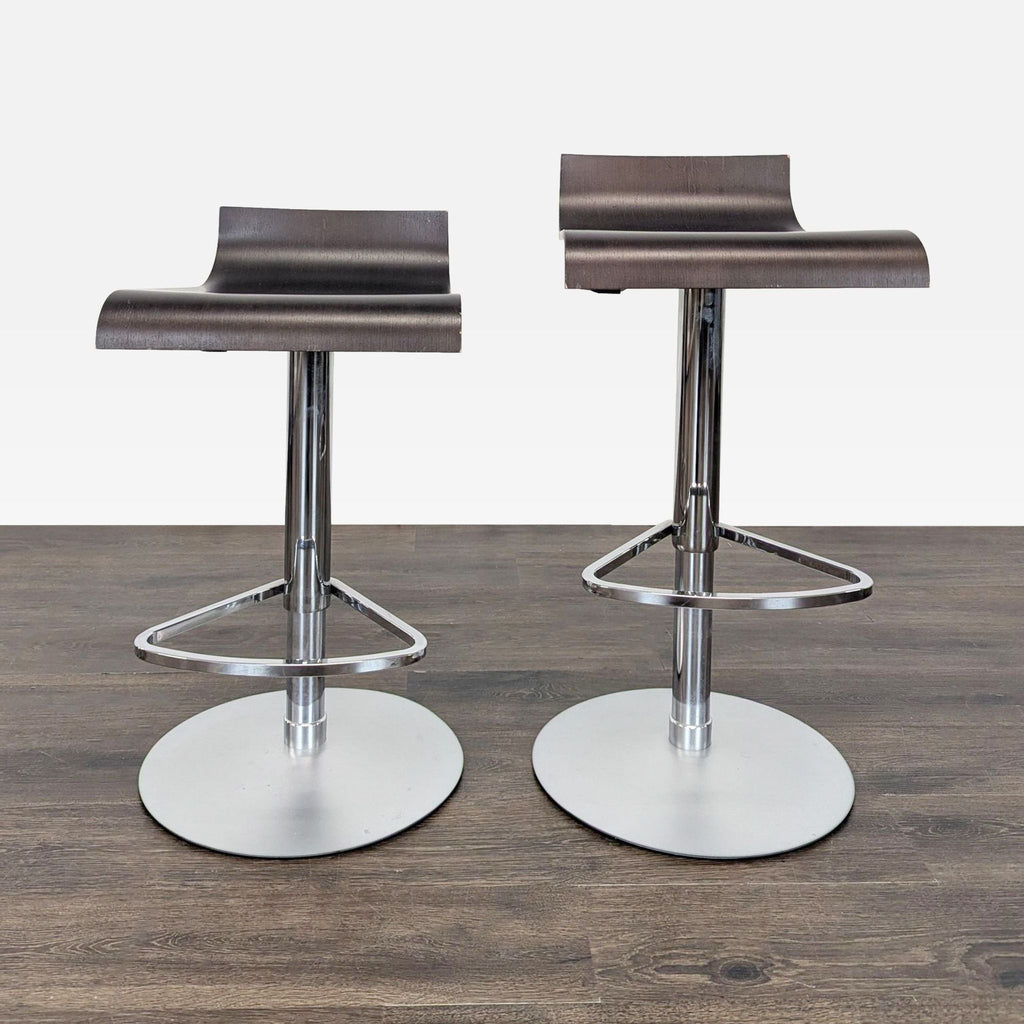 1. Pair of walnut-stained oak Ligne Roset Pam bar stools with chrome bases and hydraulic height adjustment.  