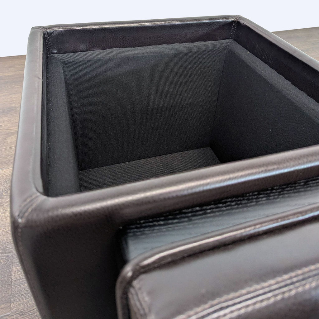 Elegant leather ottoman with hardwood frame, engineered wood panels, and convertible tray top.