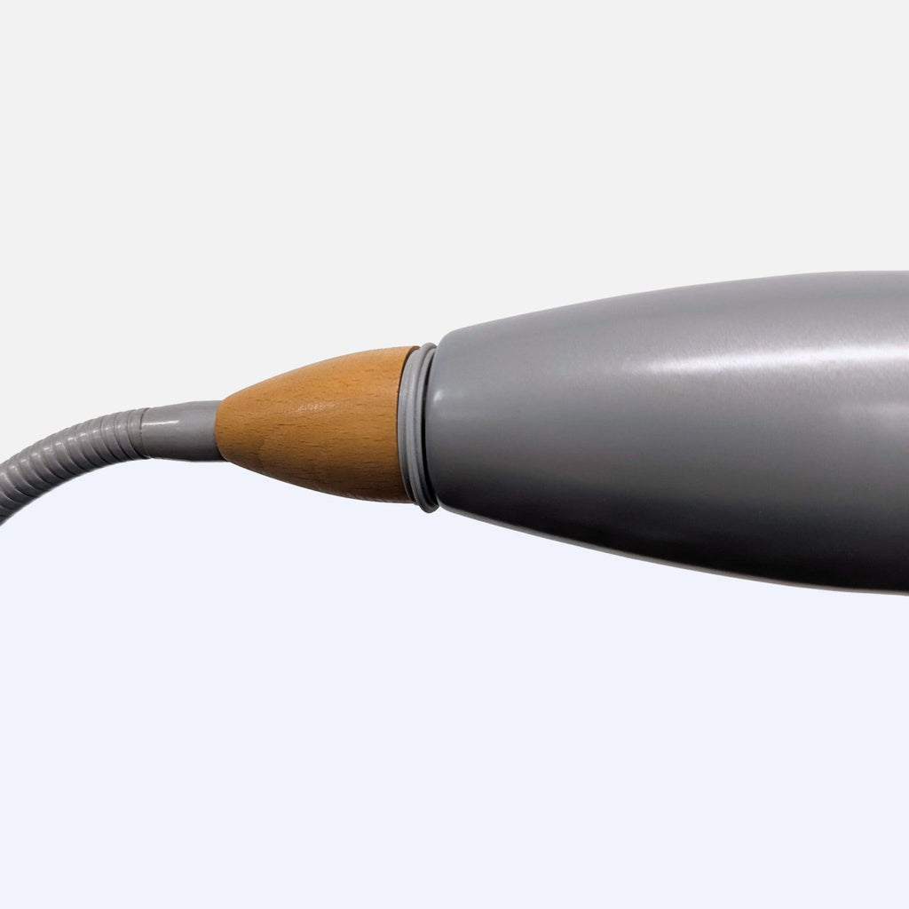 3. Close-up of the silver lamp’s flexible reading light, highlighting wood-tone accent and smooth metallic finish.