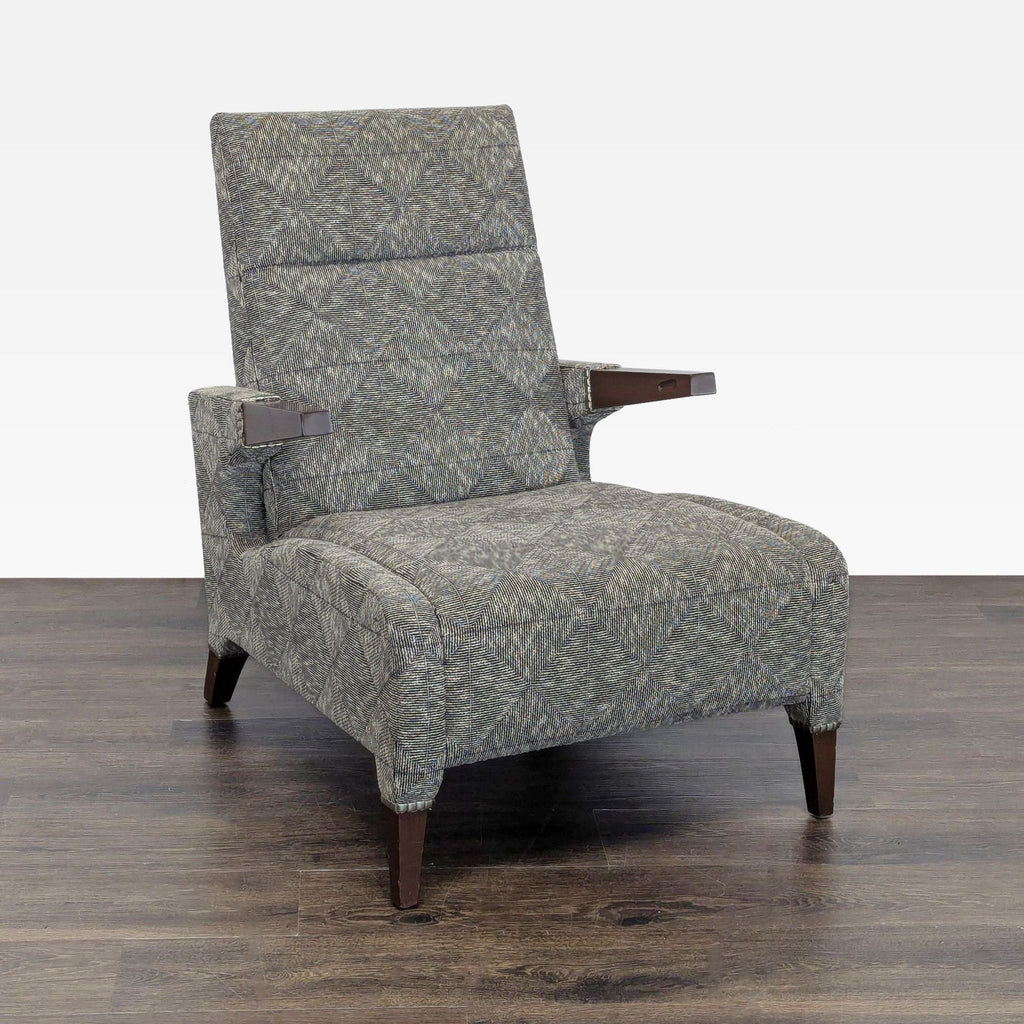 1. Front view of a Ted Boerner lounge chair with geometric-patterned upholstery and wooden arms and legs.