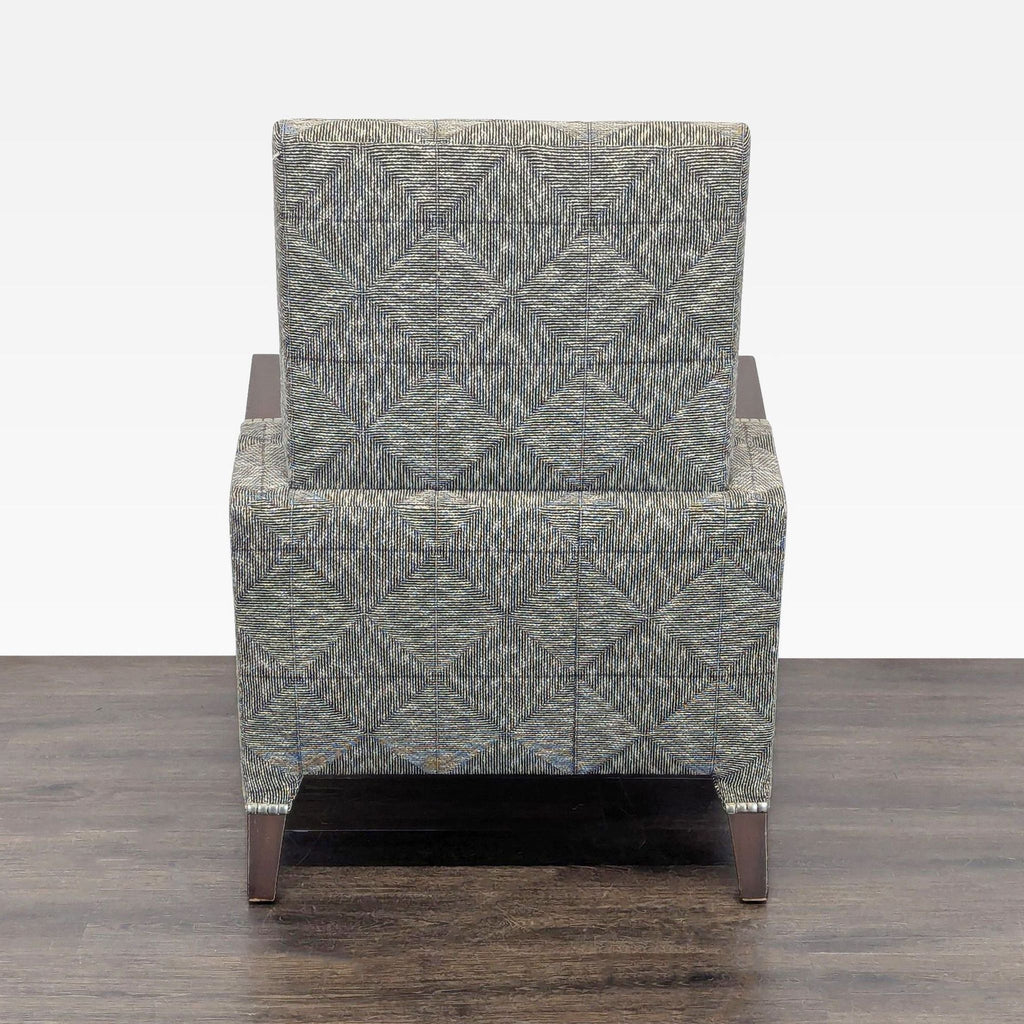 3. Rear view of patterned Ted Boerner lounge chair highlighting the modern, boxy design and wooden legs.