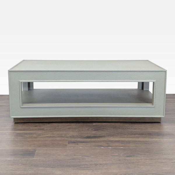 Made Goods coffee table with faux ostrich finish on a wooden base.  