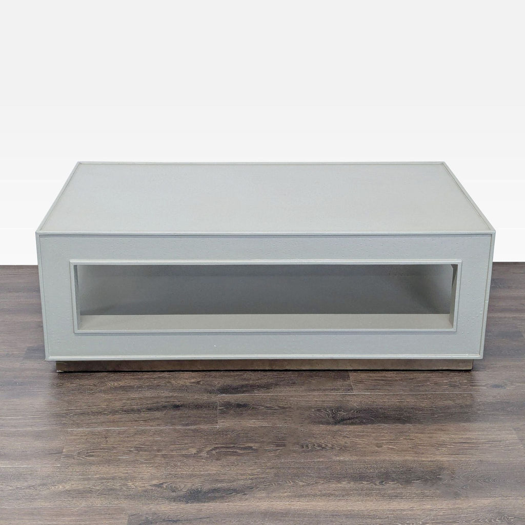 Faux ostrich covered wood coffee table from Made Goods brand.