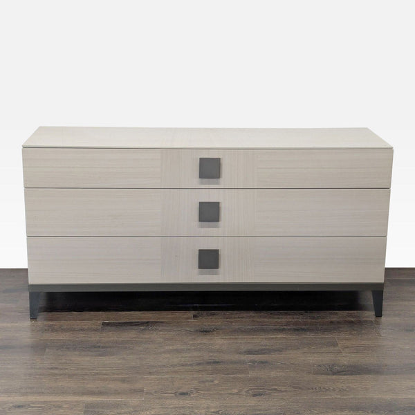 1. Front view of a modern Alf + DaFre dresser with three drawers, bold handles, and a light wood finish.
