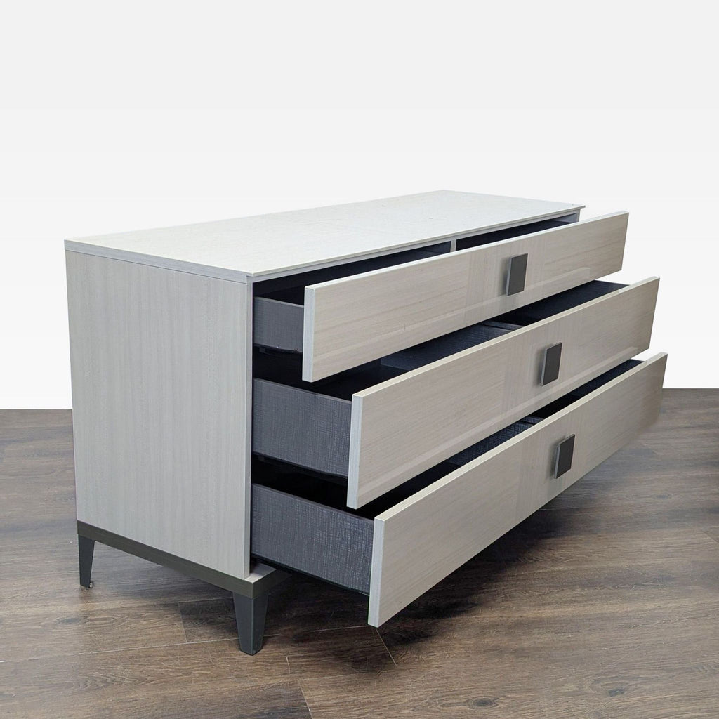 2. Side angle of the Alf + DaFre dresser showing three spacious drawers partially opened for storage.