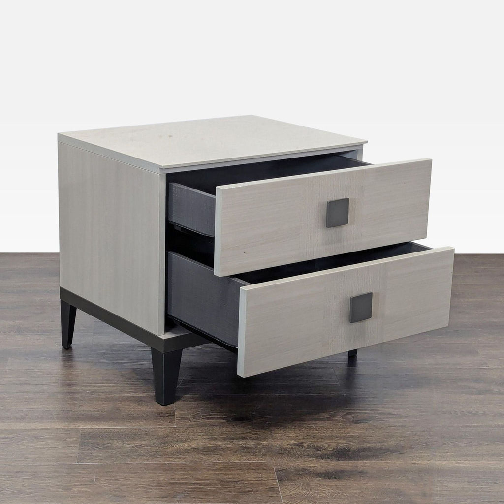 Contemporary end table by Alf + DaFre, featuring glossy pale finish and spacious drawers for stylish bedroom storage.