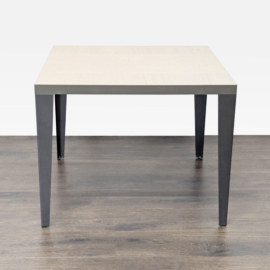 3. 357 Italian end table featuring a wood top, metal base, and elegant veneer accents.
