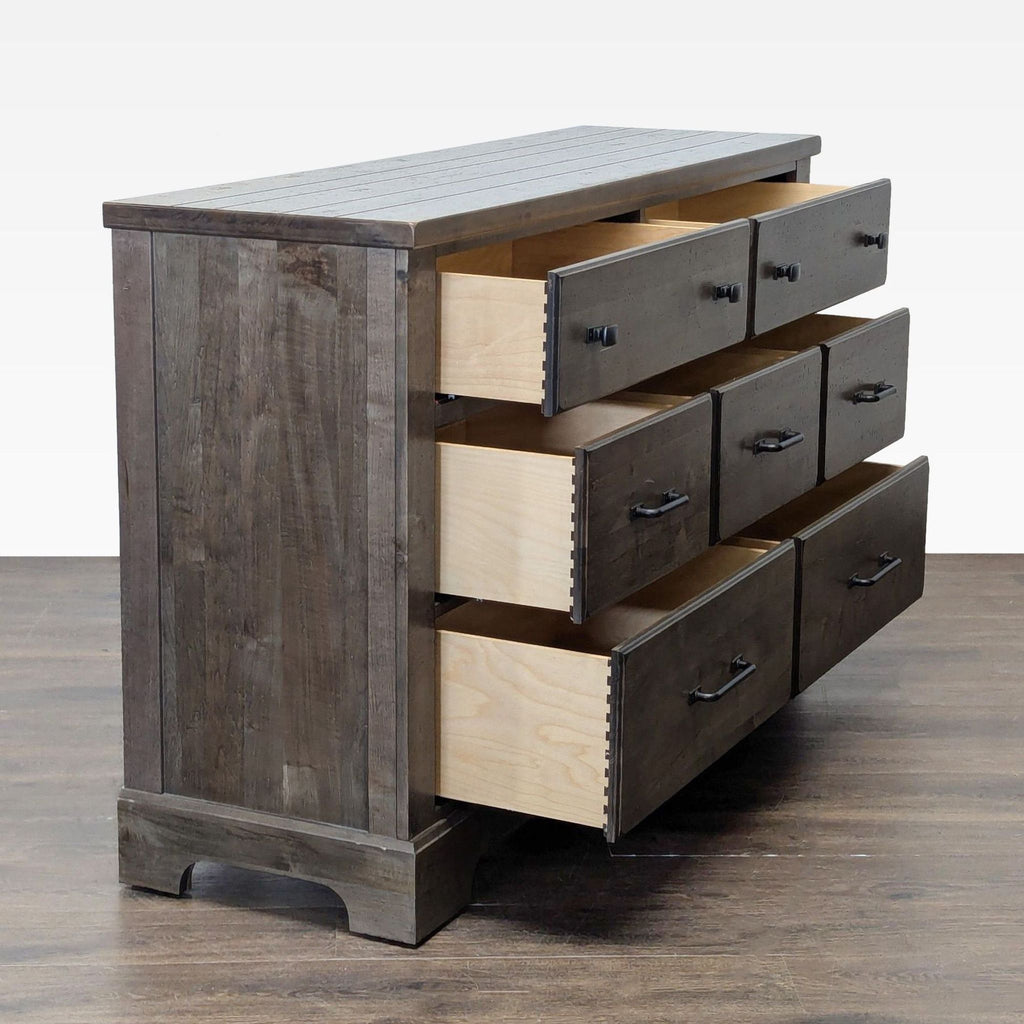 1. Classic Vaughan-Bassett dresser with six spacious drawers and a smooth wooden finish.