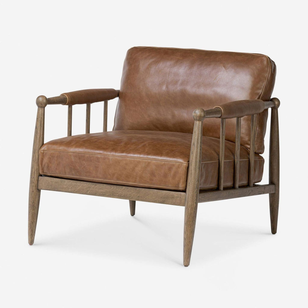 2. Angled view showing the Lulu and Georgia lounge chair’s rich leather cushion and sturdy wood structure.  