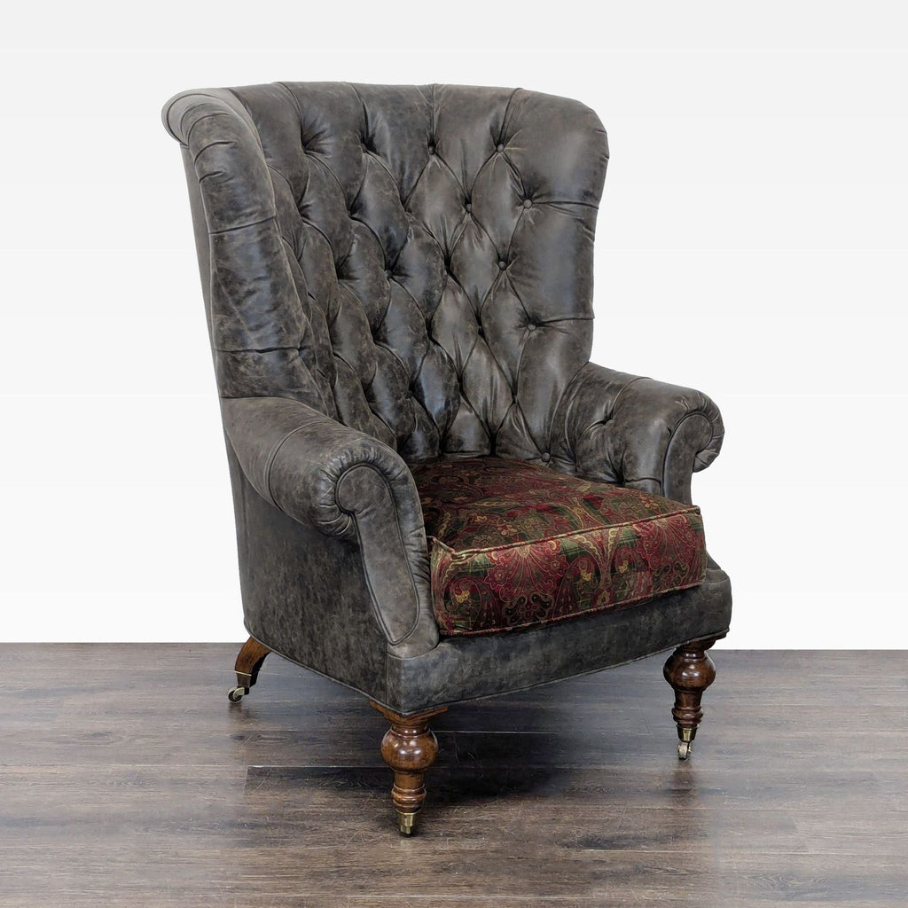 Classic lounge chair by Lillian August featuring distressed grey leather, wood legs with brass castors, and fabric seat.