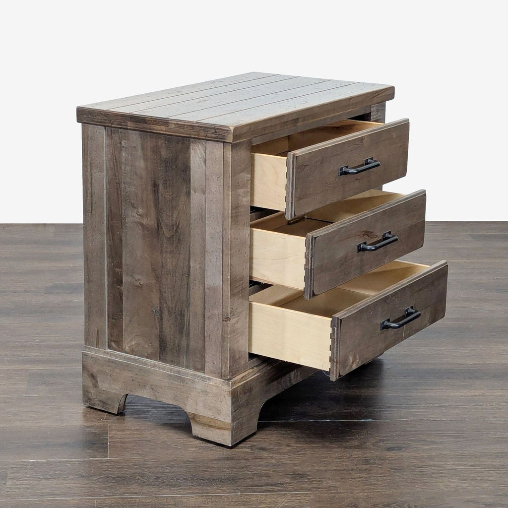 2. Side angle of Vaughan-Bassett end table showing three open drawers, solid maple and birch wood.