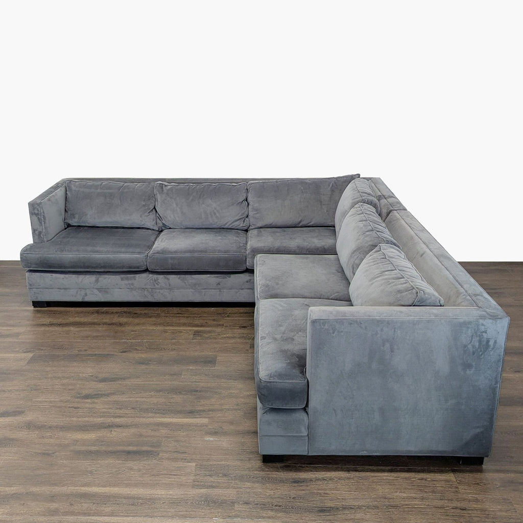 Mitchell Gold + Bob Williams sectional in soft gray velvet, sturdy and stylish for a contemporary living room.
