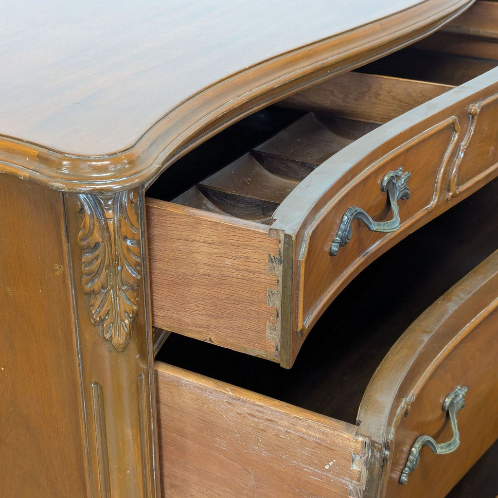 Classic John Stuart Inc. dresser featuring elegant carved details, spacious drawers, and sturdy wood construction.