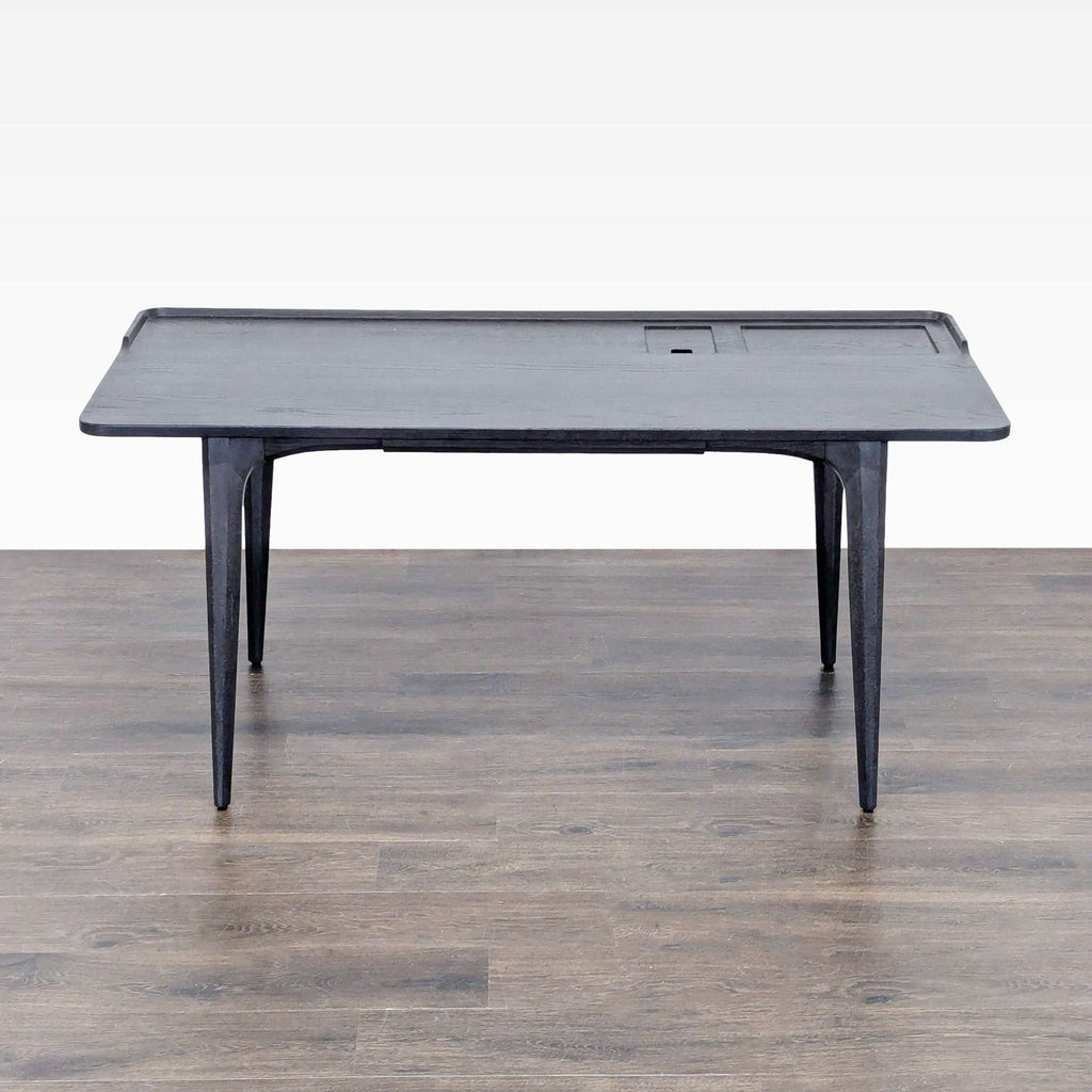 2. Modern District Eight desk in black wood finish, featuring clean lines and a spacious, elegant workspace.