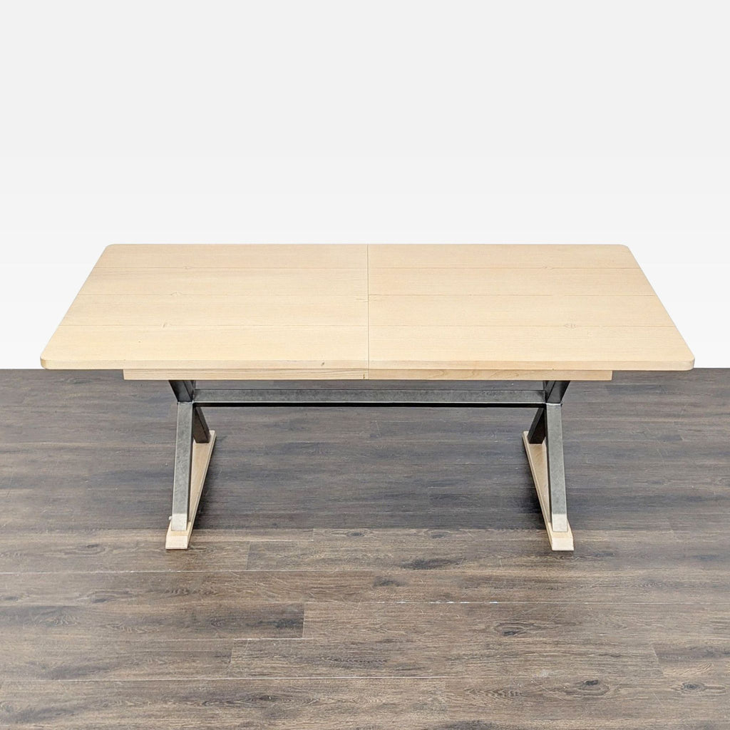 3. Overhead view of a rectangular dining table with a light wood plank top and metal base, suitable for dining spaces.