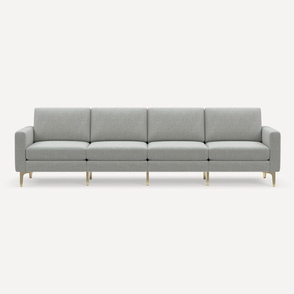 Spacious Burrow sofa in light gray, highlighted by durable gold legs and minimalist, modern design.