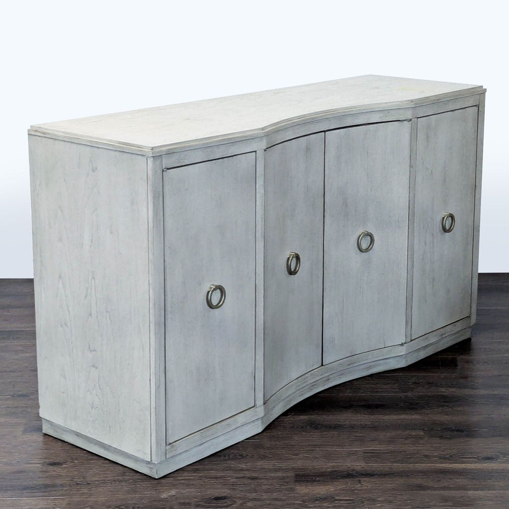 3. Rachael Ray Home credenza with reversible wine bottle shelves, storage dividers, and a silverware tray drawer.
