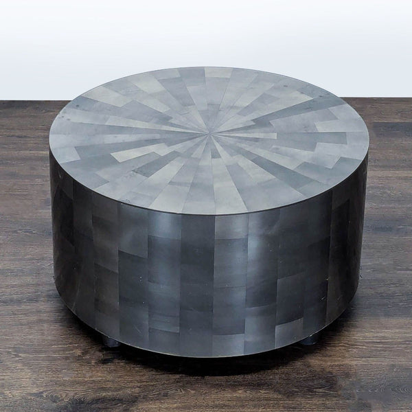 Handcrafted resin drum coffee table with clear and silvered finish by Oly Studio.