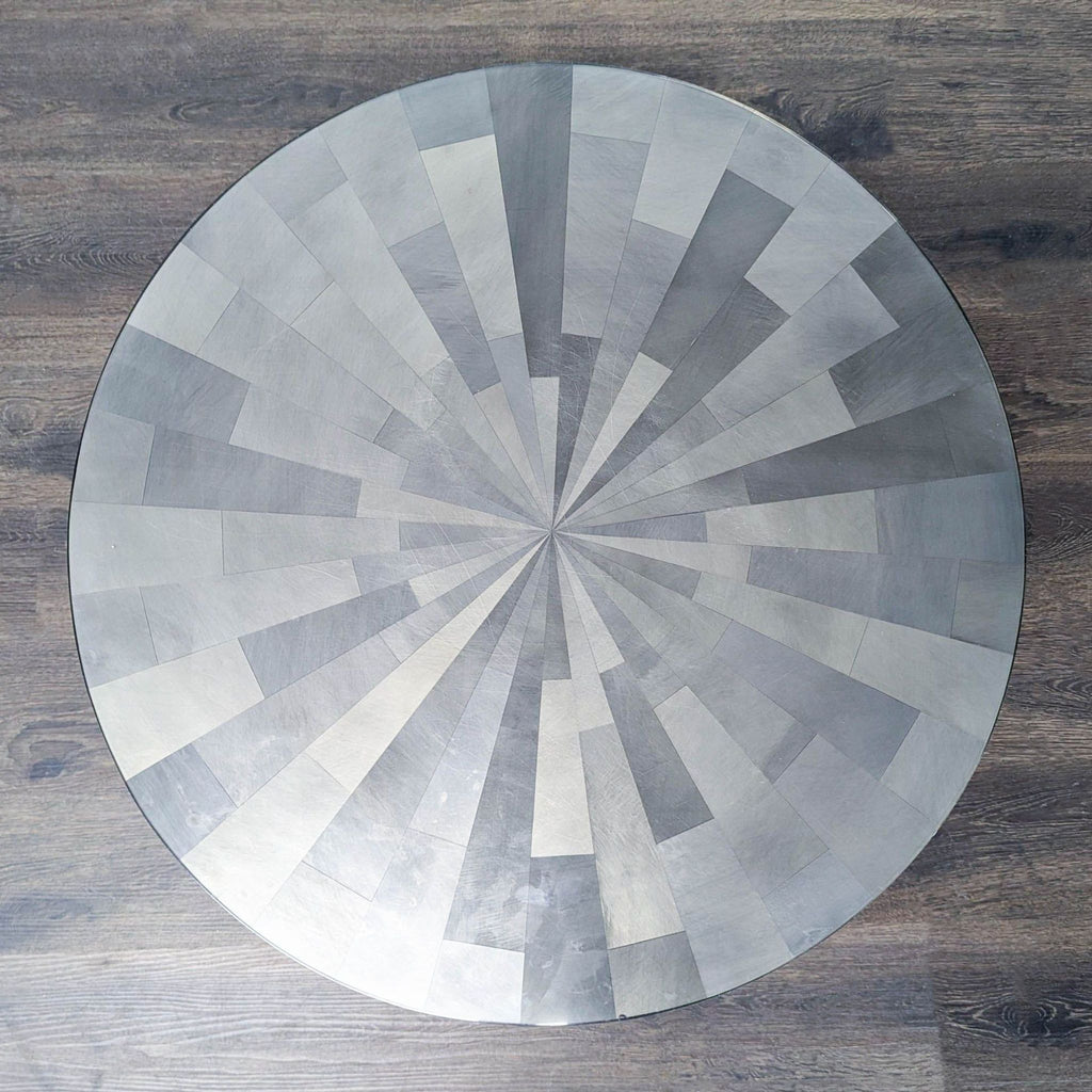 Oly Studio's drum table with artisan clear resin and silvered surface; unique coffee table piece.