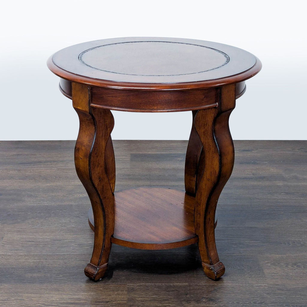 Refined end table in traditional style, showcasing gracefully shaped cabriole legs.
