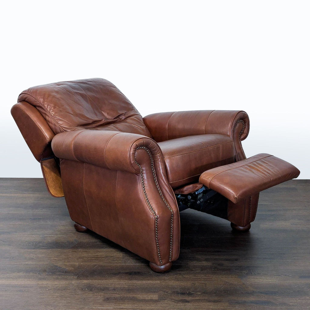 Classic recliner chair in soft brown leather, features supportive cushioning and easy reclining for comfort.