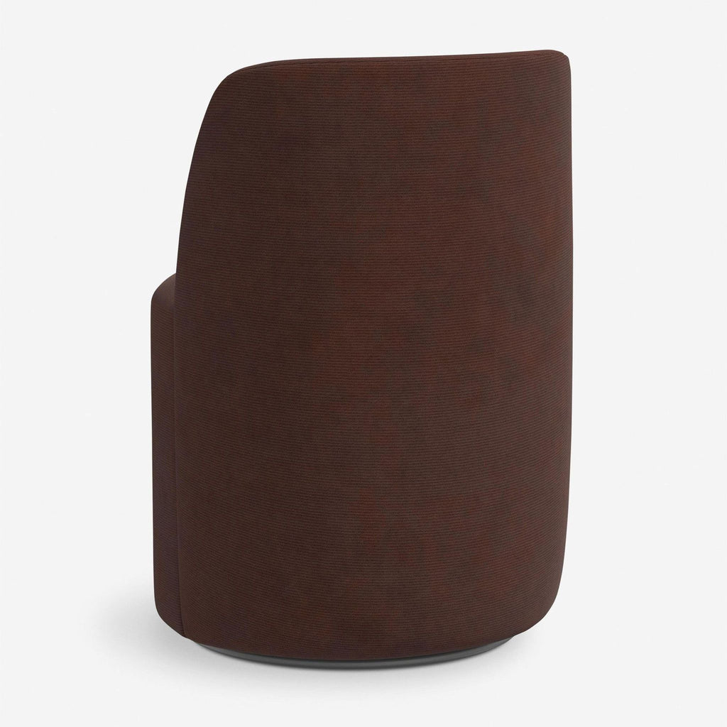 Lulu and Georgia dining chair with sleek silhouette, barrel back, and wine corduroy fabric on a swivel base.