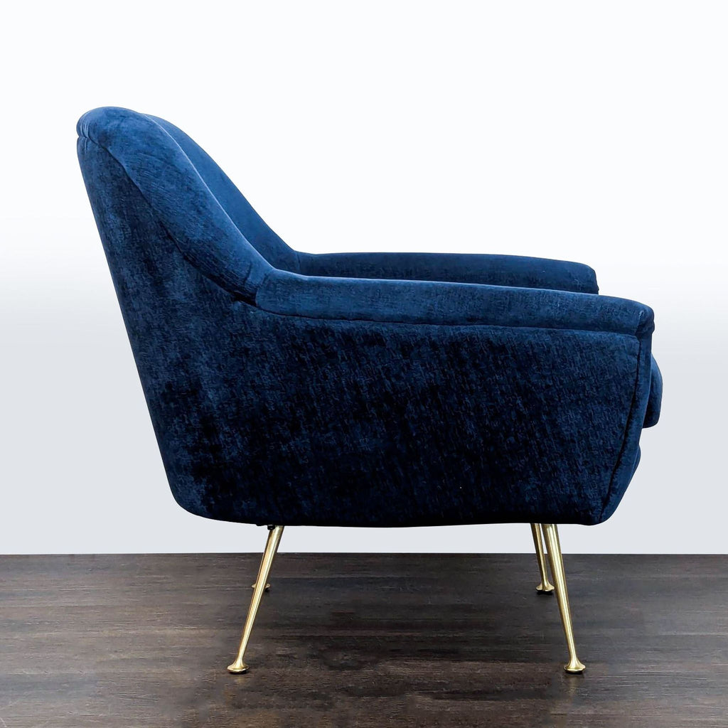 West Elm lounge chair, soft blue velvet upholstery and gold metal legs, ideal for chic lounge spaces.