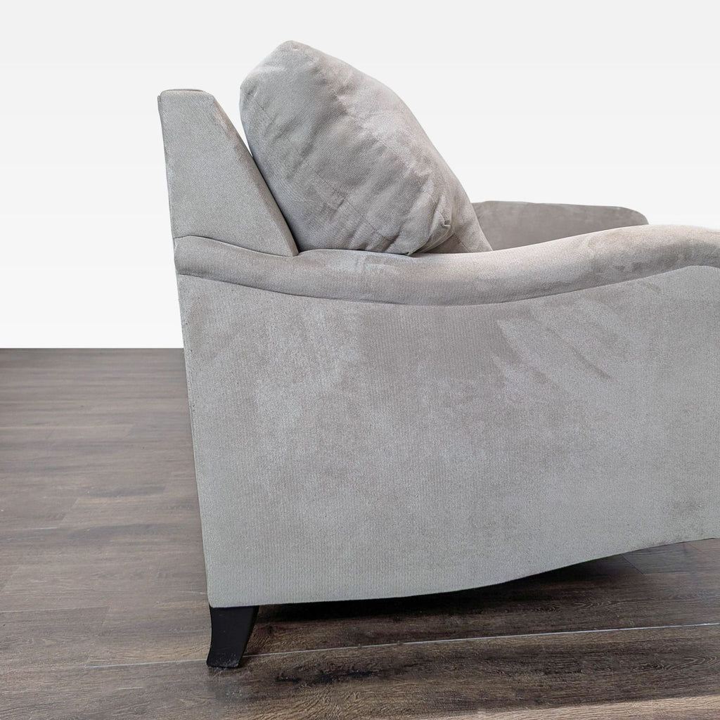 Comfortable sectional featuring sturdy legs, plush cushions, and versatile design for living or family rooms.