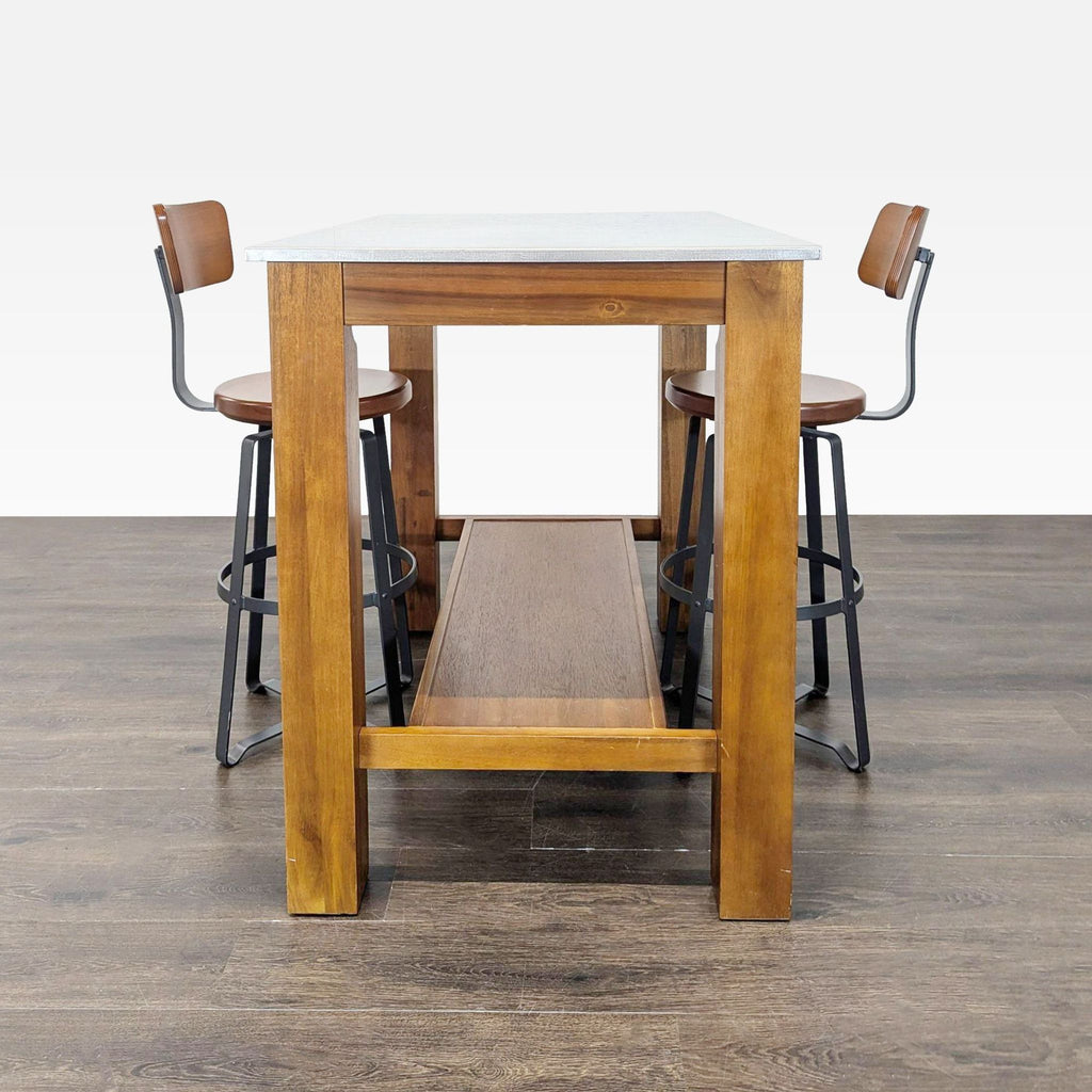 Industrial-style dining set featuring a wood and metal table with matching bar stools and an extra lower shelf.  