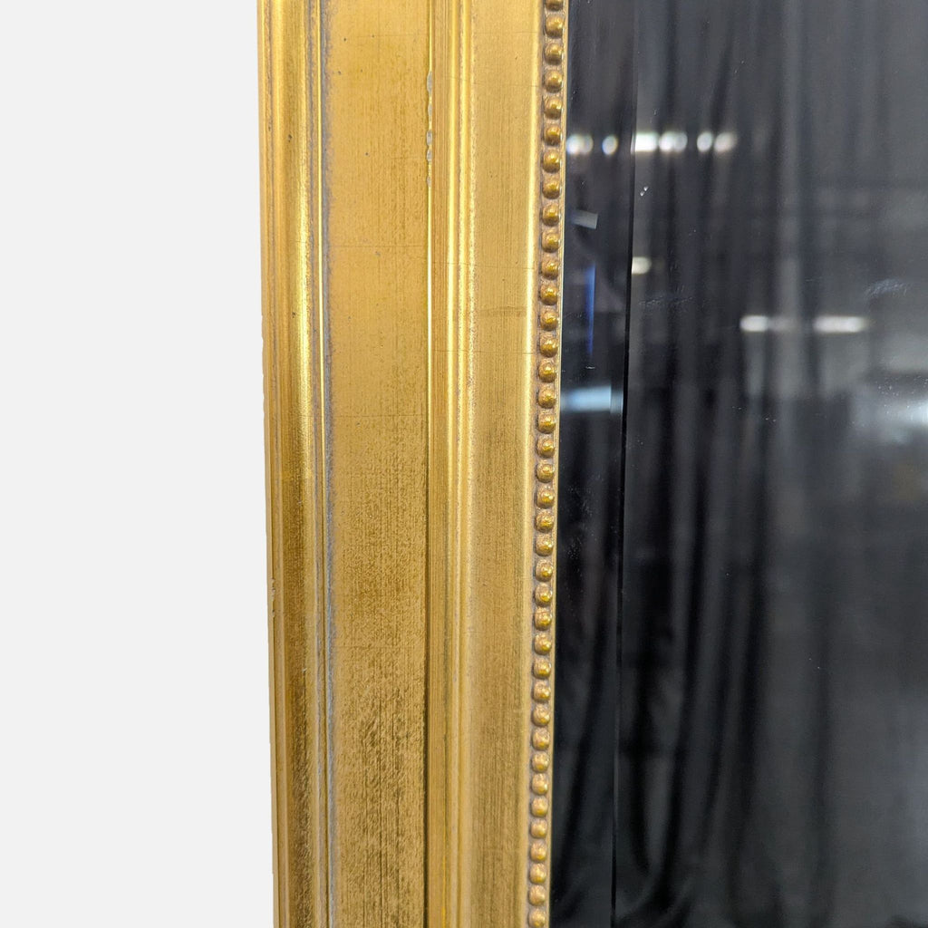 Elegant floor mirror with a slim gold frame, ideal for adding sophistication to interiors.