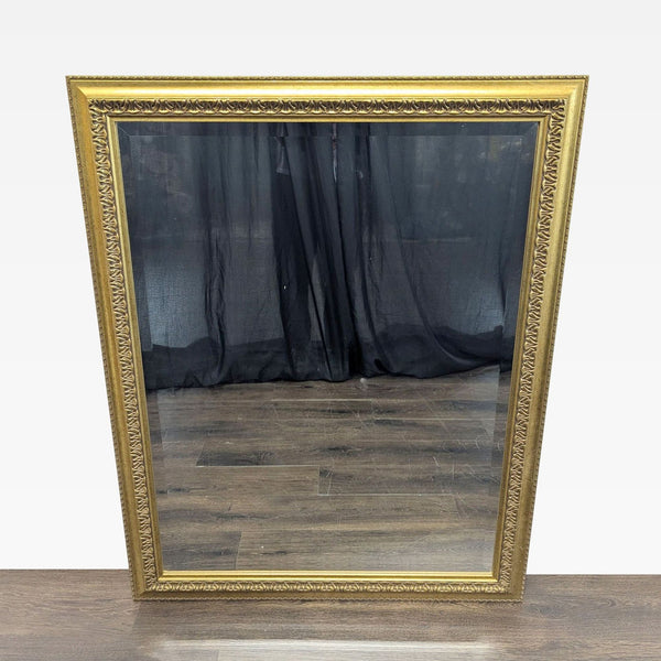 1. Rectangular mirror with an ornate gold frame, shown standing on a wooden floor against a black curtain.