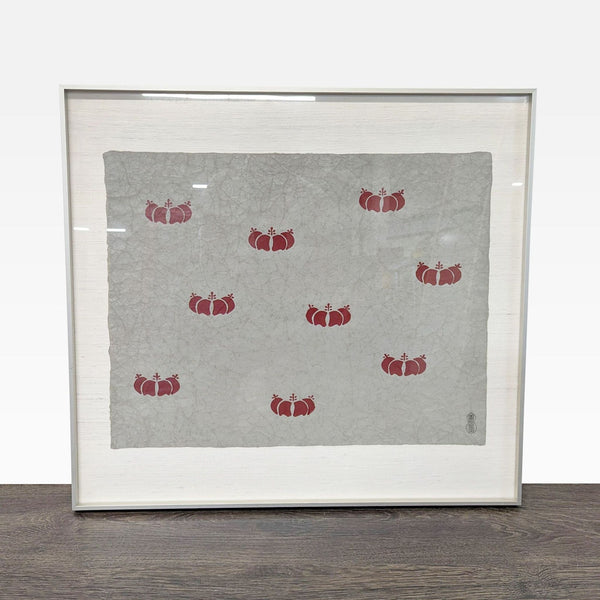 Red pomegranate pattern art print on textured gray paper, framed with cream mat and artist seal visible.
