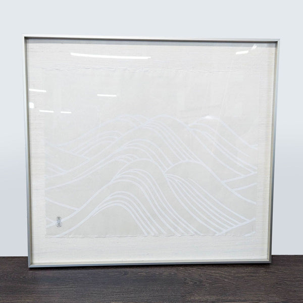 1. Framed minimalist Japanese print with elegant white wave patterns on silk paper, featuring an artist stamp.