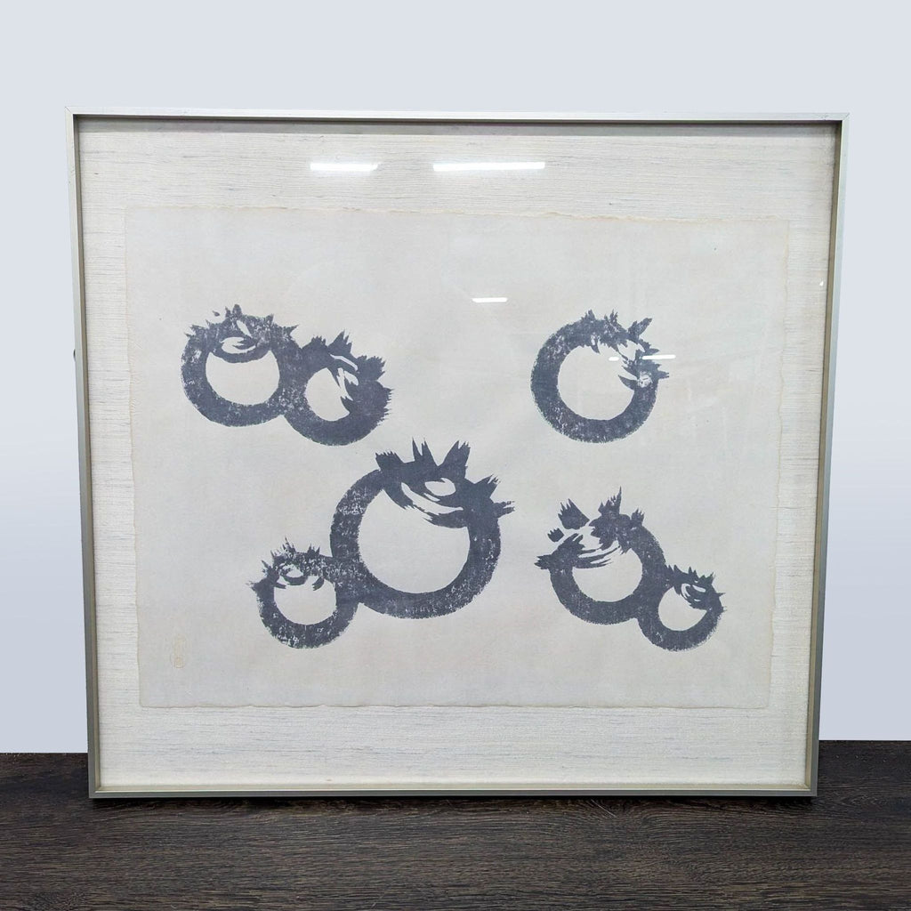 1. Framed Asian ink painting on silk with abstract black circular brush forms, floated over linen backing.