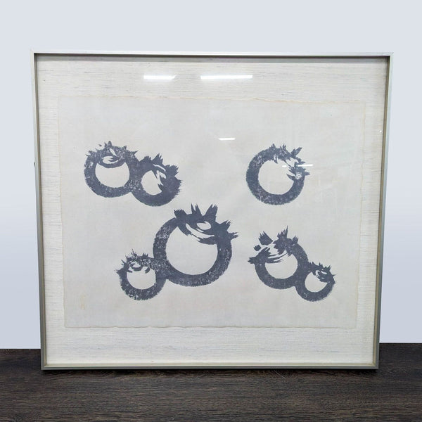 1. Framed Asian ink painting on silk with abstract black circular brush forms, floated over linen backing.