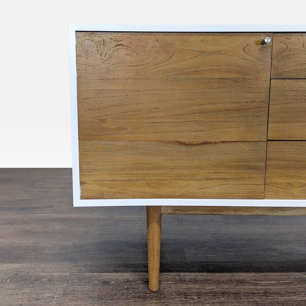 Scandinavian Designs sideboard, laminate and wood, two cabinets with shelves and three central drawers.